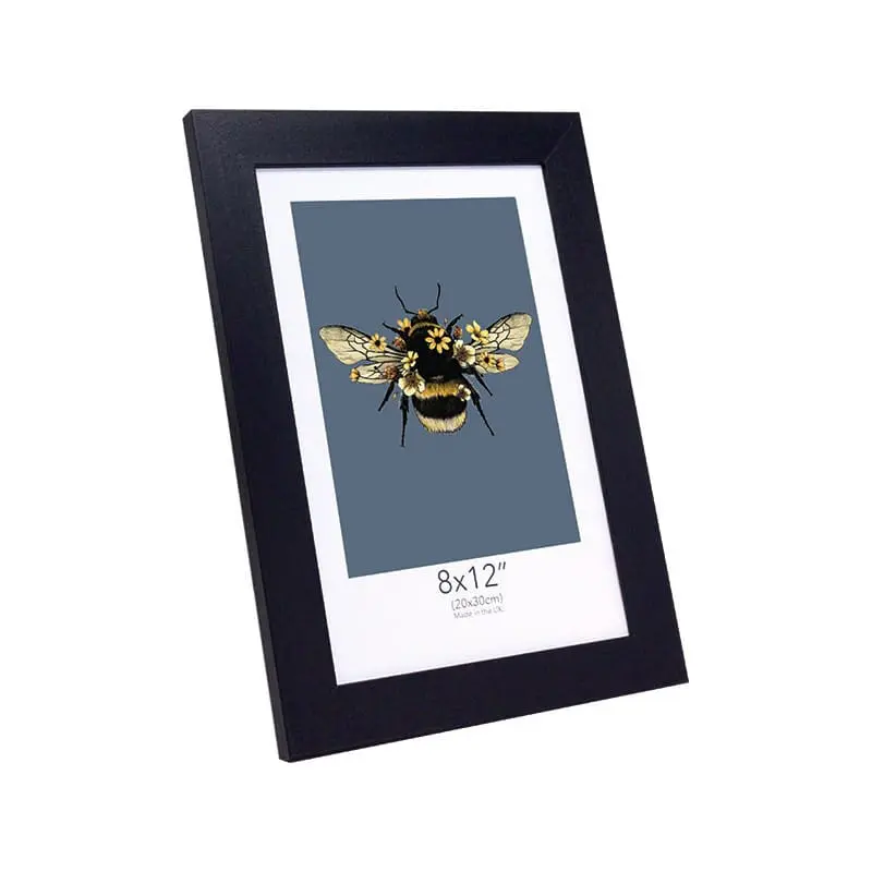 Framed bee illustration with flowers and dimensions.